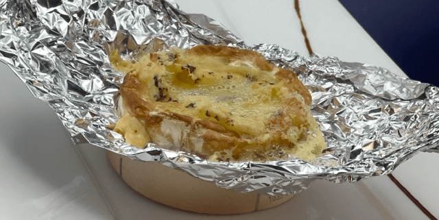 Baked Camembert, just truffled and its mouillettes