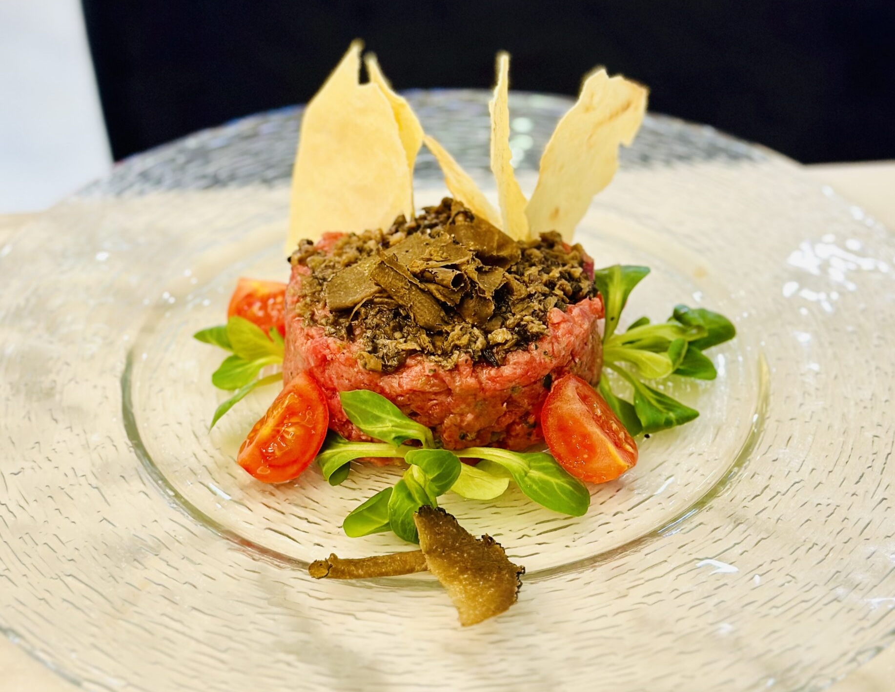 Beef noble tartare with black truffles and toasts - Bubble Bar