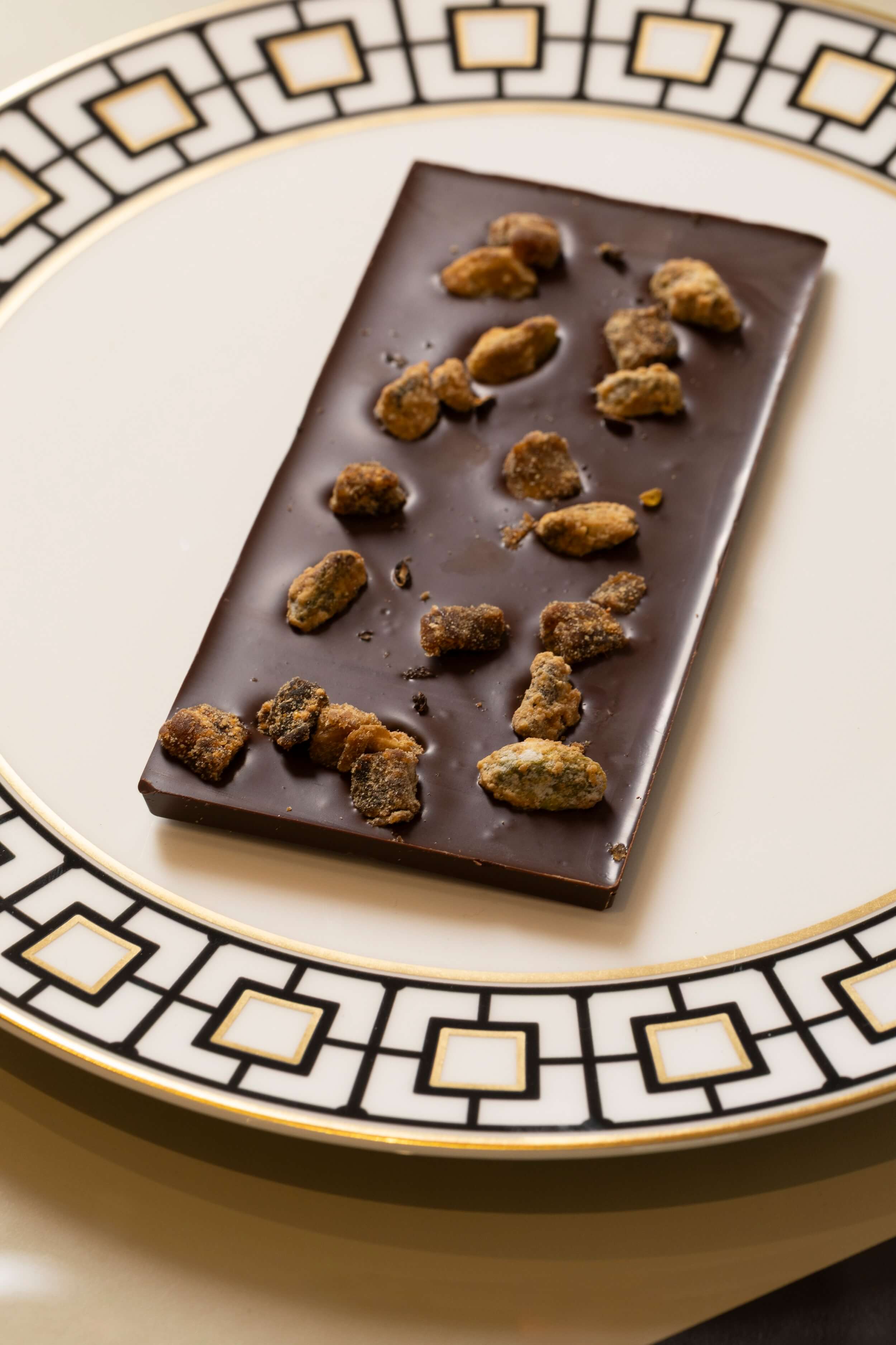 Milk Chocolate Bar with Pistachio Praline & Timut Pepper - Anour Chocolat Menu & Delivery | Mr Room Service