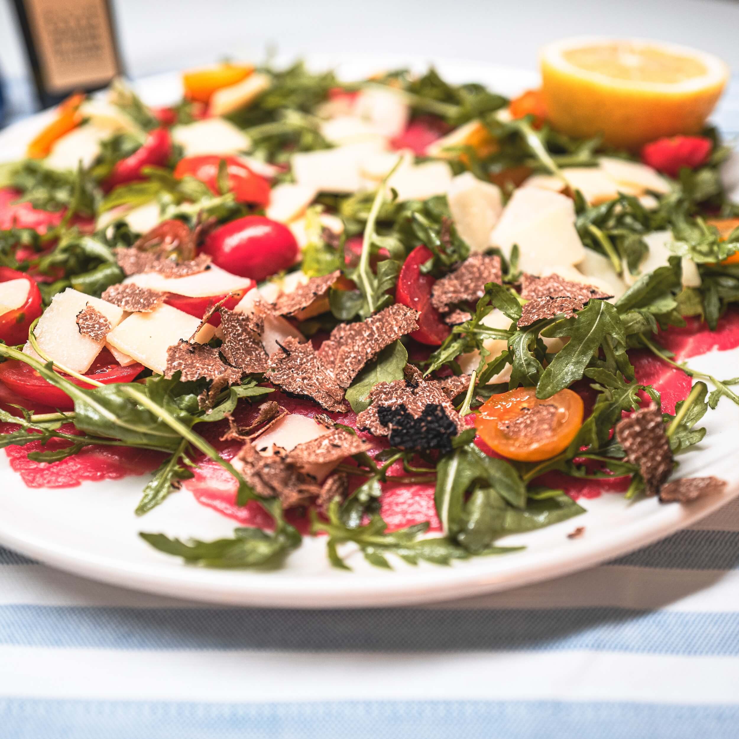Our Super Beef Carpaccio with truffle - Caffe Milano | Italian Restaurant Delivery in Monaco