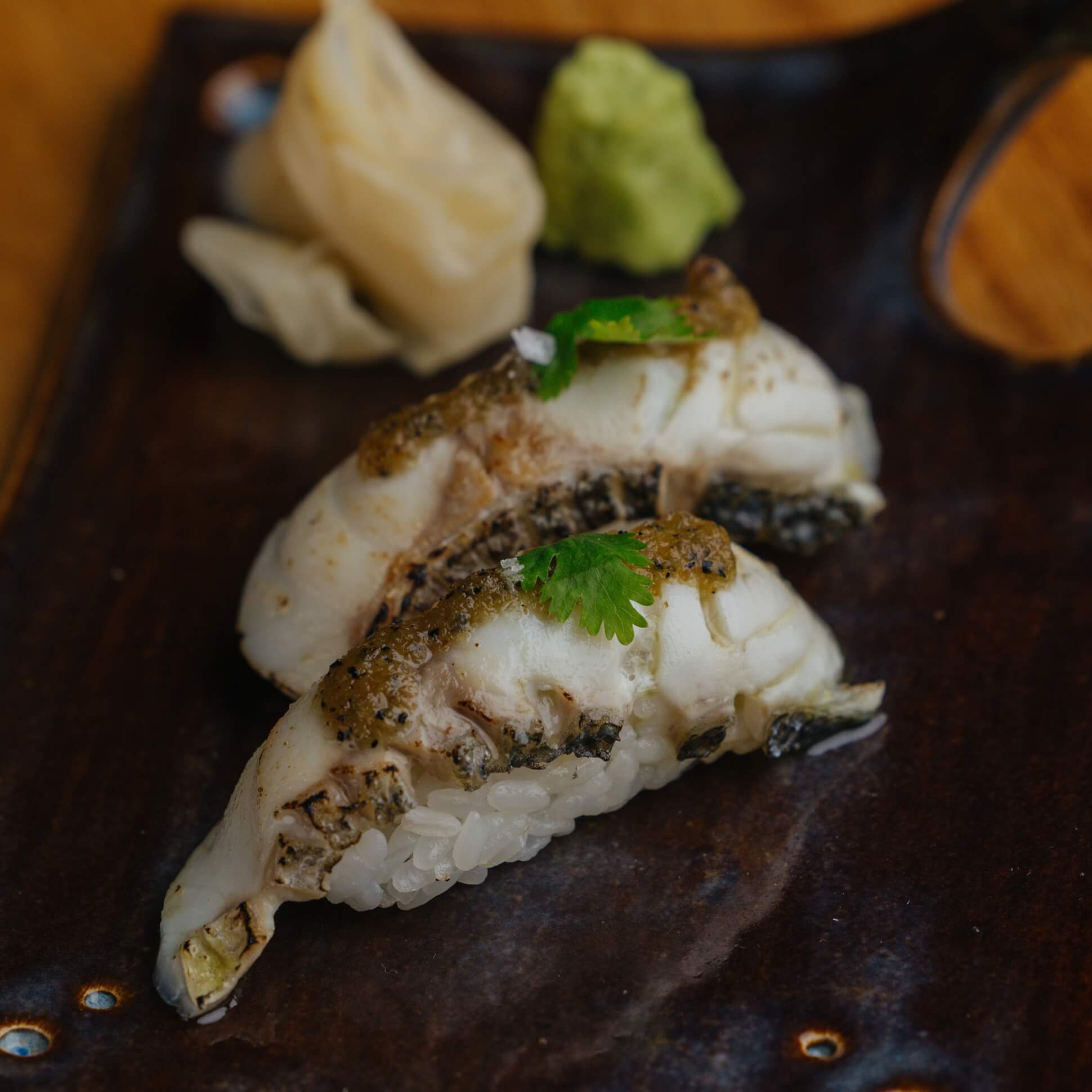 Sea bass flambé - 99 Sushi Bar