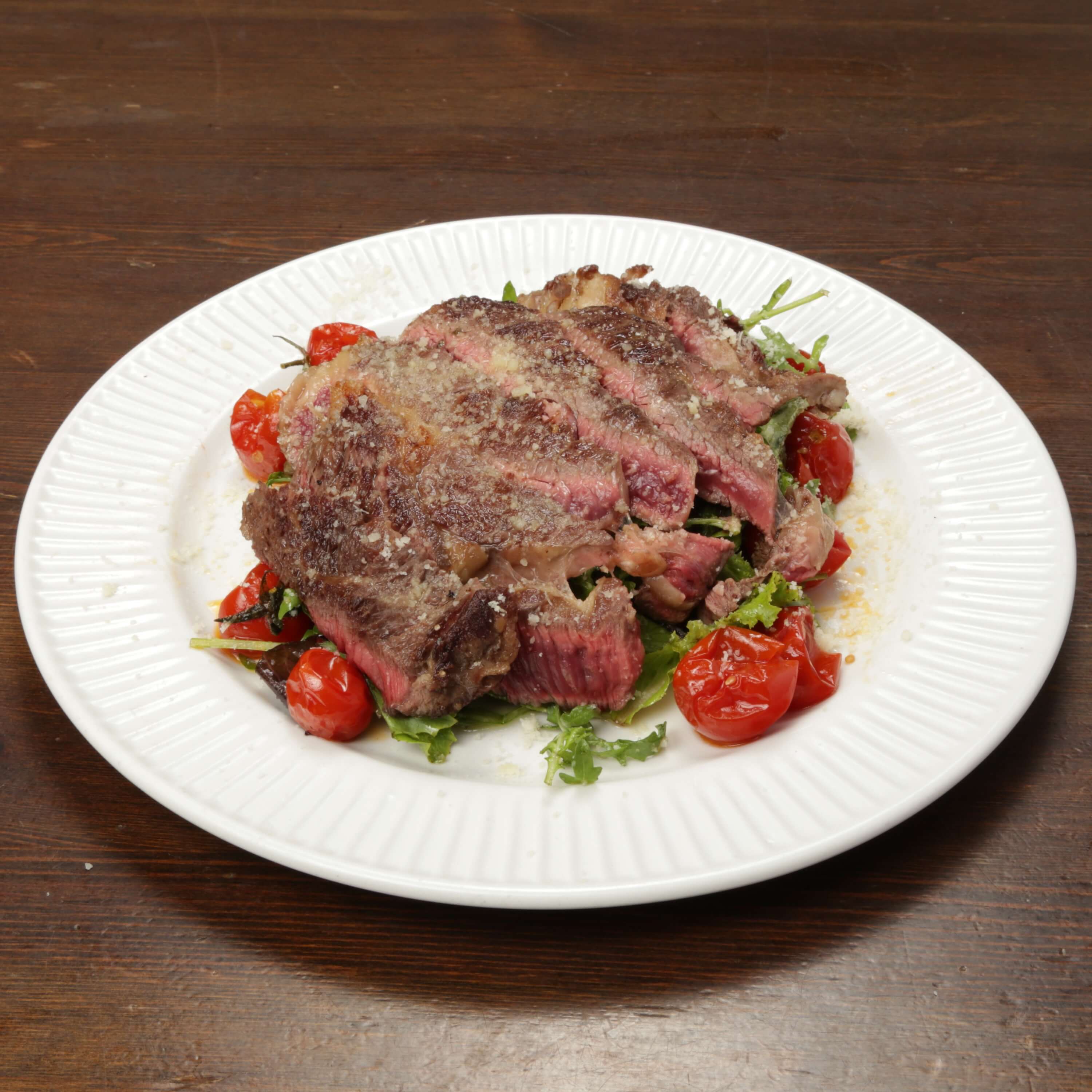 Tagliata beef roasted tomatoes parmesan - Prince Of Venice | Delivery in Monaco