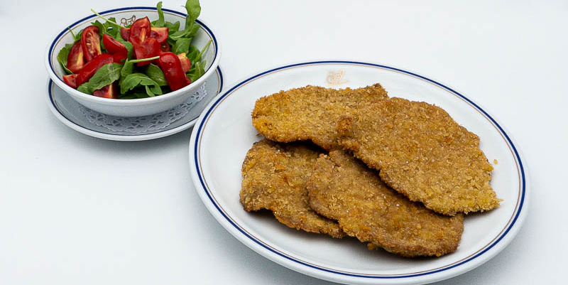 Veal Farfalle alla Milanese with Rucola and Cherry Tomatoes